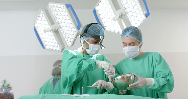 Surgeons Performing Complex Surgery in Operating Room - Download Free Stock Images Pikwizard.com