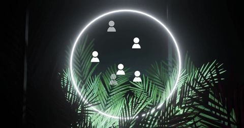 Neon ring with avatars floating above palm leaves in dark gallery
