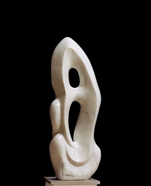 Abstract Modern Stone Sculpture Against Dark Background - Download Free Stock Photos Pikwizard.com