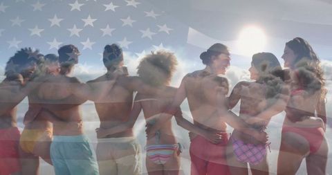 Diverse friends embracing on beach with american flag overlay