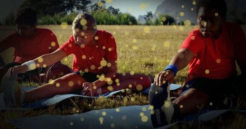 Children Stretching Outdoors in Natural Park Setting