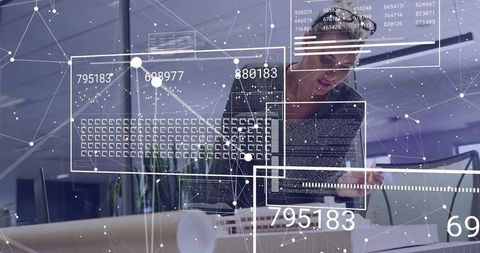 Architect reviewing advanced digital designs in modern office