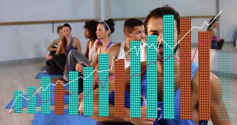 Bearded man practicing barre in group fitness class with rising bar chart overlay