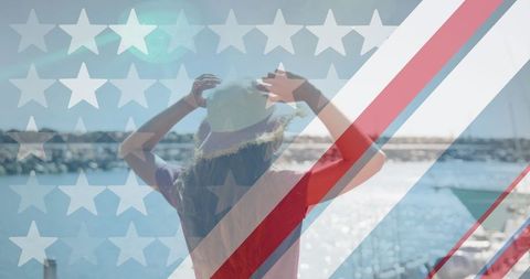 Rear View of Woman on Pier with Overlaid American Flag Design