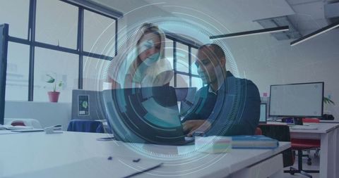 Office professionals collaborating in modern open-plan workspace