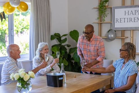 Diverse Senior Friends Celebrating a Retirement Party at Home