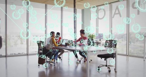 Innovative Business Team Brainstorming with Digital Technology Overlay