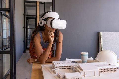 Architect Using VR Technology for Model Evaluation