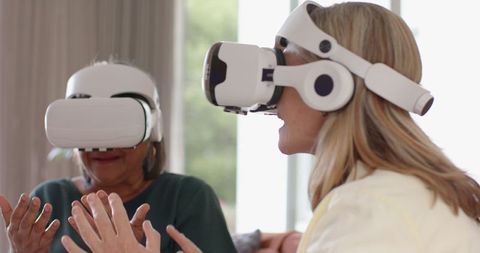 Family Engaged with Virtual Reality in Modern Living Room