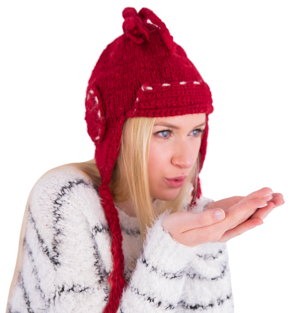 Woman in Red Hat Blowing Snow from Hands on Transparent Background - Download Free Stock Videos Pikwizard.com