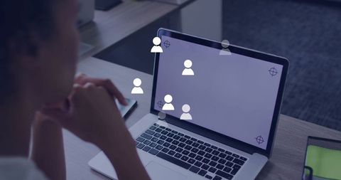 Businesswoman engaged in laptop videoconference interaction