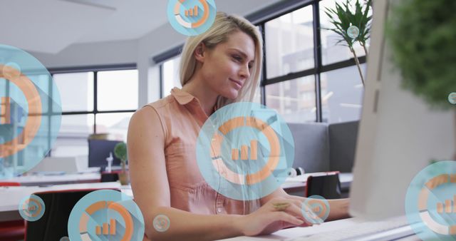 Woman Analyzing Digital Data on Computer in Modern Office - Download Free Stock Images Pikwizard.com