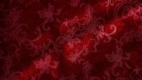 Luxurious deep-red velvet with embroidered floral damask pattern for upholstery
