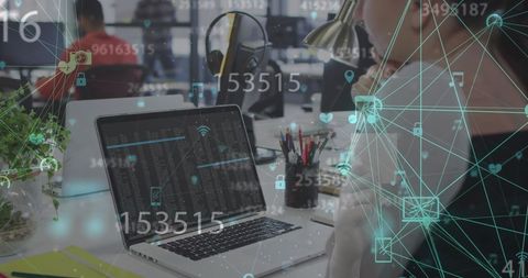 Digital Fintech Analysis Being Conducted by Businesswoman in Modern Office