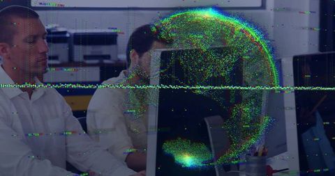 Digital globe hologram illuminates office workspace