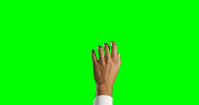 Woman's hand reaching upwards against green screen background. Ideal for presentations, educational materials, and advertisements. Perfect for adding customized text or images in post-production.