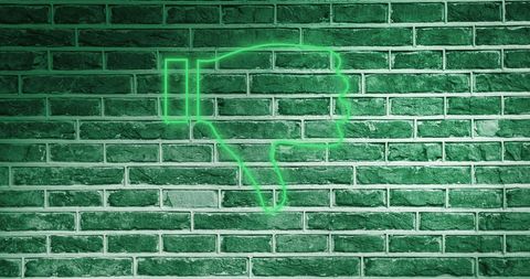 Neon Thumbs Down on Brick Wall Symbolizes Disapproval - Download Free Stock Images Pikwizard.com