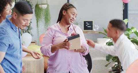 Office Birthday Celebration with Excited Colleagues and Balloons