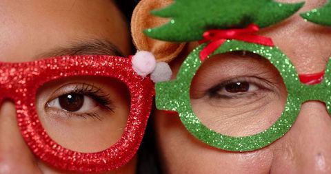Mother and daughter share moment in festive glitter eyewear