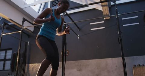 Athletic woman cross training with intensity