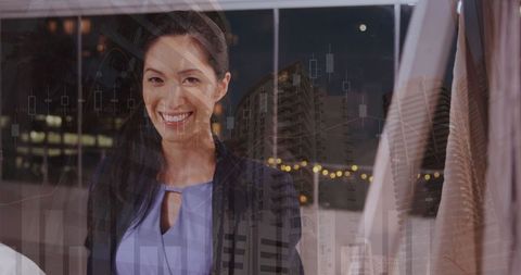 confident businesswoman in modern office with financial graphics overlay - Download Free Stock Images Pikwizard.com