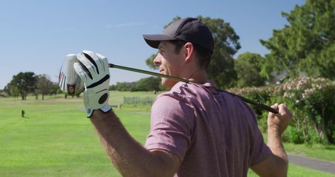 Male Golfer Enjoying Day on Course with Golf Club - Download Free Stock Images Pikwizard.com