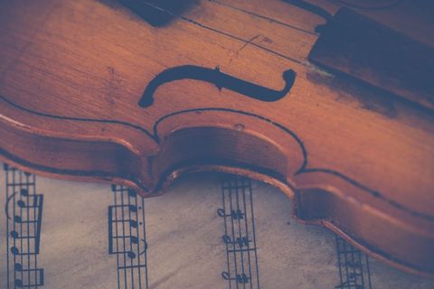 Vintage Violin and Sheet Music Close-Up