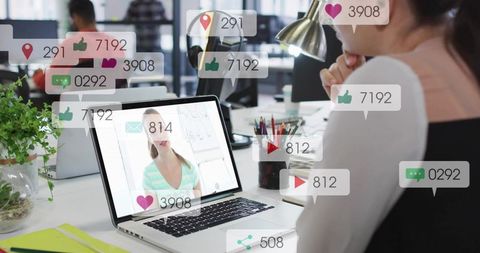 Professional watching laptop with social media reactions and engagement overlays