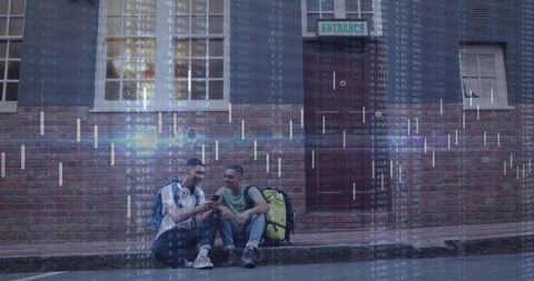 Urban Teenagers Chatting About Technology in City