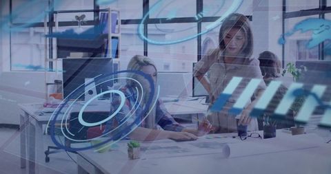 Collaborative Team Analyzing Digital Information in Tech Office