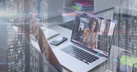Professional Woman Conducting Online Meeting on Laptop