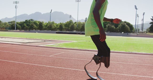 Athlete with Running Blades Training on Track under Clear Sky - Download Free Stock Images Pikwizard.com