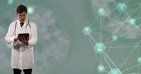 Doctor Utilizing Tablet with Medical Technology Graphics