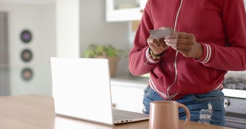 Woman Using Credit Cards by Laptop at Home - Download Free Stock Images Pikwizard.com