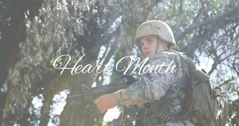 Soldier with Rifle in Forest During Heart Month