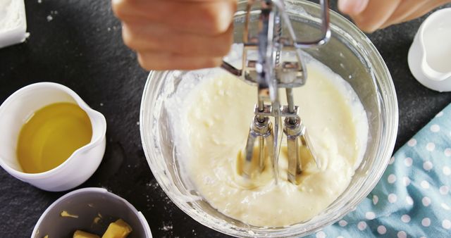 Mixing Ingredients in Bowl with Electric Hand Mixer for Baking - Download Free Stock Images Pikwizard.com