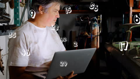 Mechanic Analyzing Data with Laptop and Floating Numbers