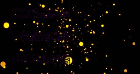 Bright Yellow Particles Floating on Black Background