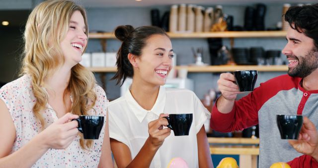 Friends Enjoying Coffee Together in Cafe Setting - Download Free Stock Images Pikwizard.com