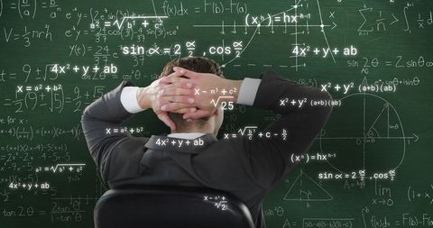 businessman analyzing complex mathematical equations - Download Free Stock Images Pikwizard.com