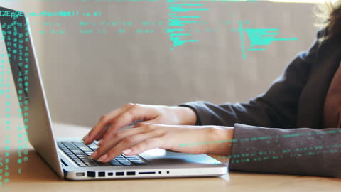 Businesswoman Typing on Laptop with Digital Data Overlay