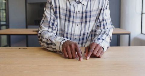 Business Professional Gesturing During Meeting Discussion