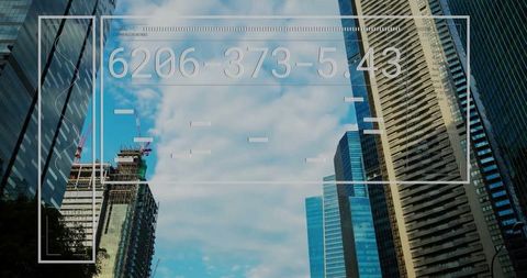 Futuristic Data Interface Overlay on Vibrant Cityscape