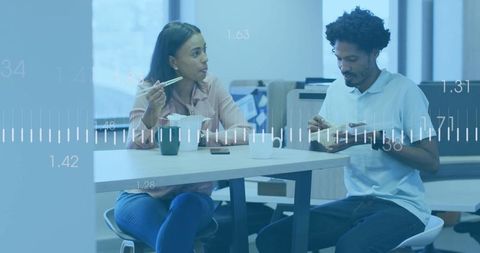 Office colleagues sharing lunch break with takeout and conversation