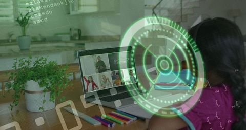 Child sitting at home table focusing on laptop during remote learning with AR HUD overlay