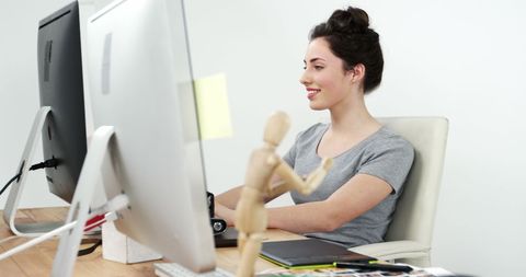 Creative Graphic Designer Focusing on Dual Screens at Modern Office - Download Free Stock Images Pikwizard.com