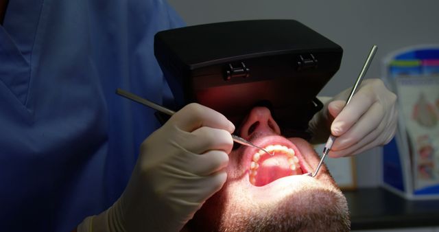 Dentist Using Virtual Reality Glasses for Dental Procedure - Download Free Stock Images Pikwizard.com