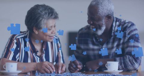 Senior Couple Enjoying Puzzle Time Together at Home
