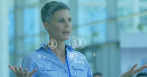 Businesswoman Presenting on Global Networking in Modern Office