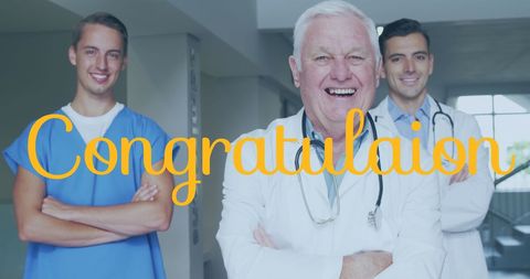 Group of doctors smiling with congratulations text overlay